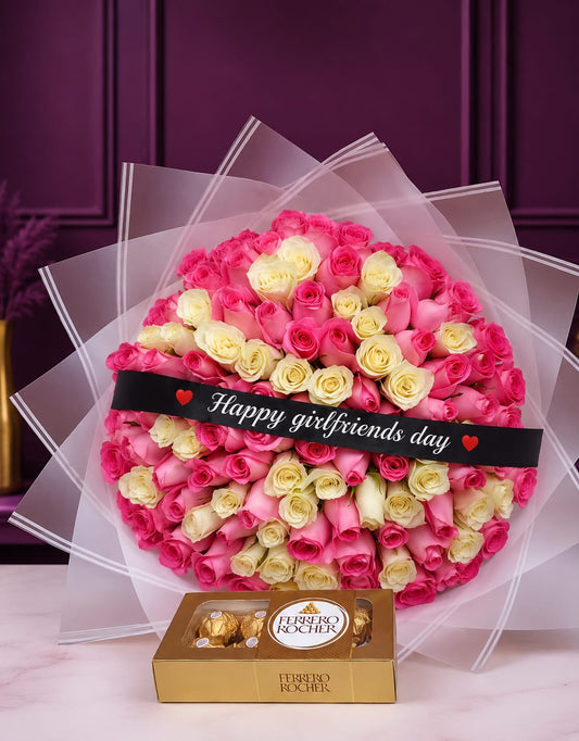 100 premium pink and white roses in sheer wrap with Happy Girlfriend's Day black sash and Ferrero Rocher chocolates on purple background